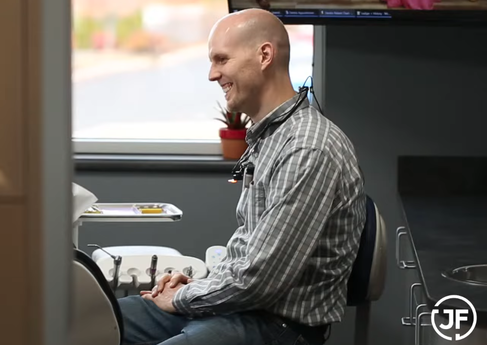 Dr. Fisher consulting with a patient at his Lewiston dental office