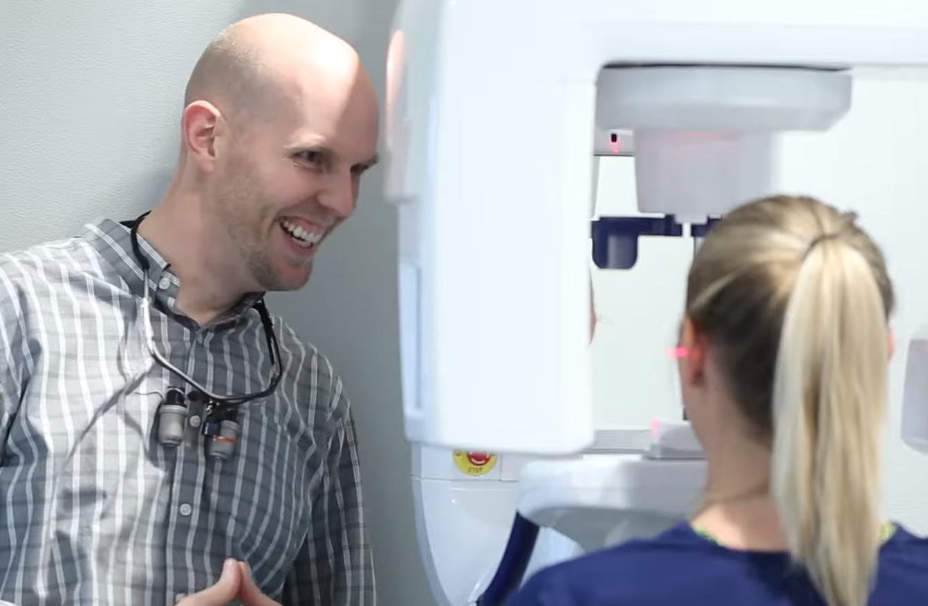 Dr. Fisher with dental X-ray equipment in Pullman, WA