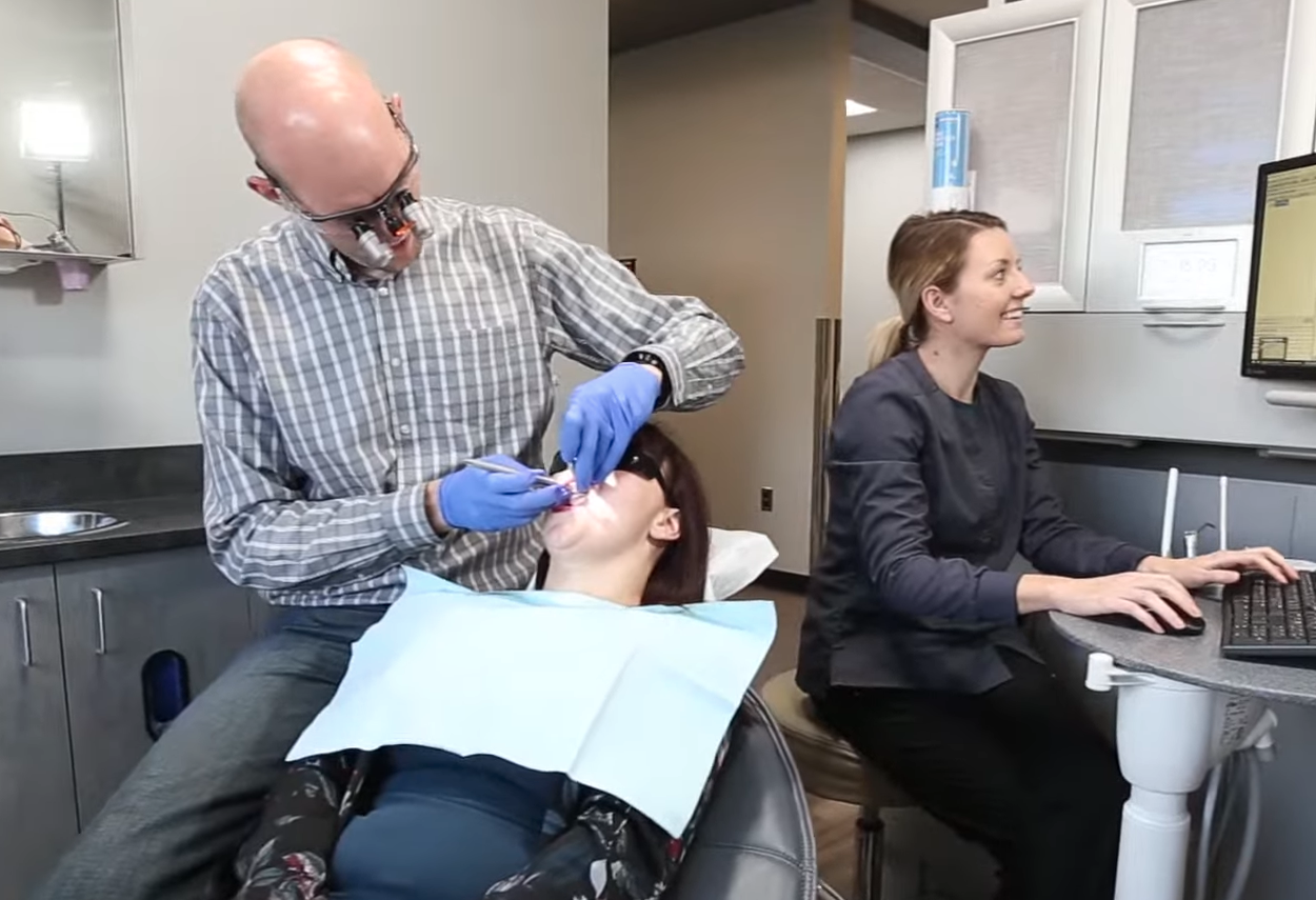 Dr. Fisher treating a patient at his Pullman dental office
